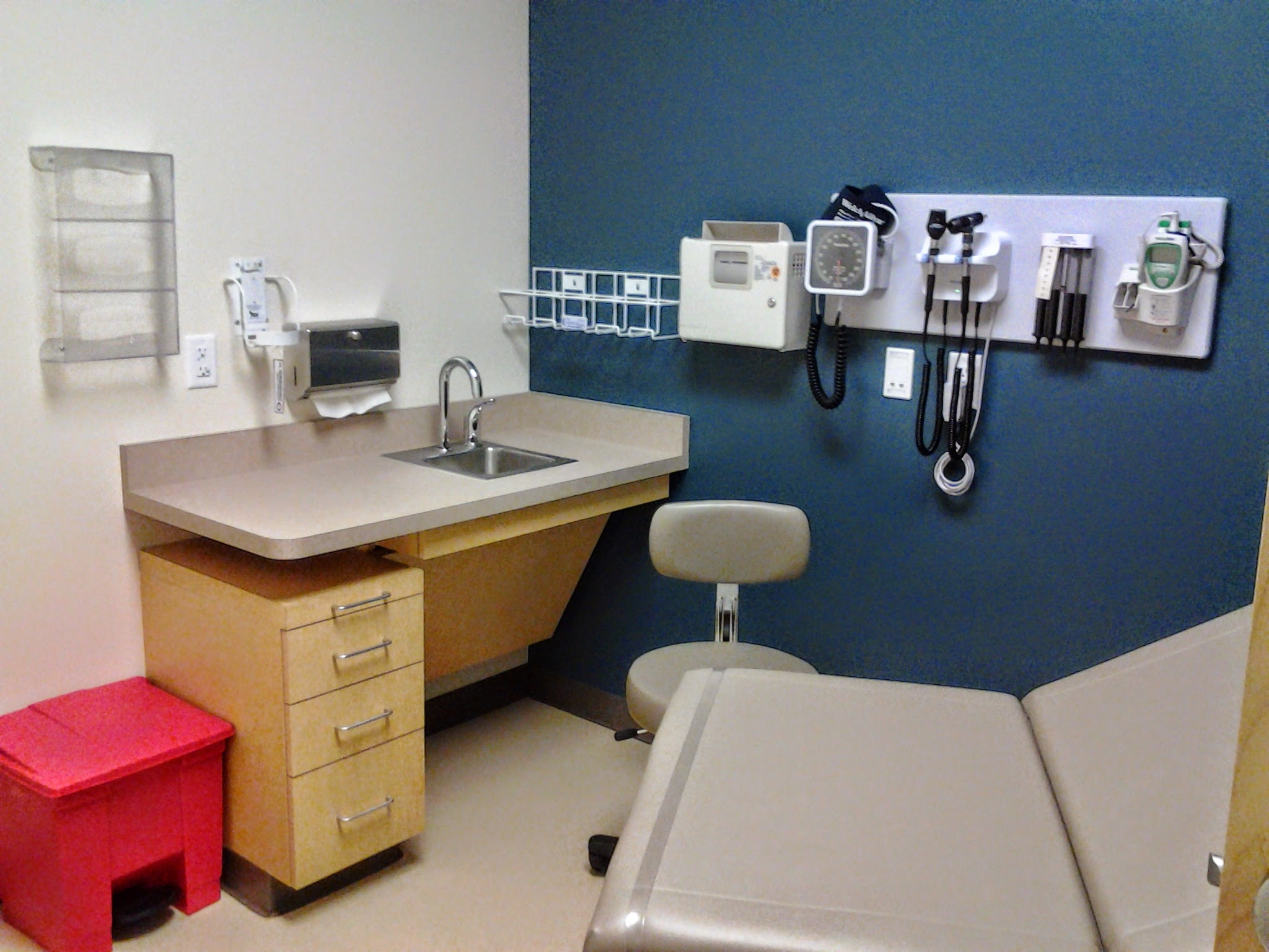 Medical equipment and wall-mounted instruments in a completed examination room